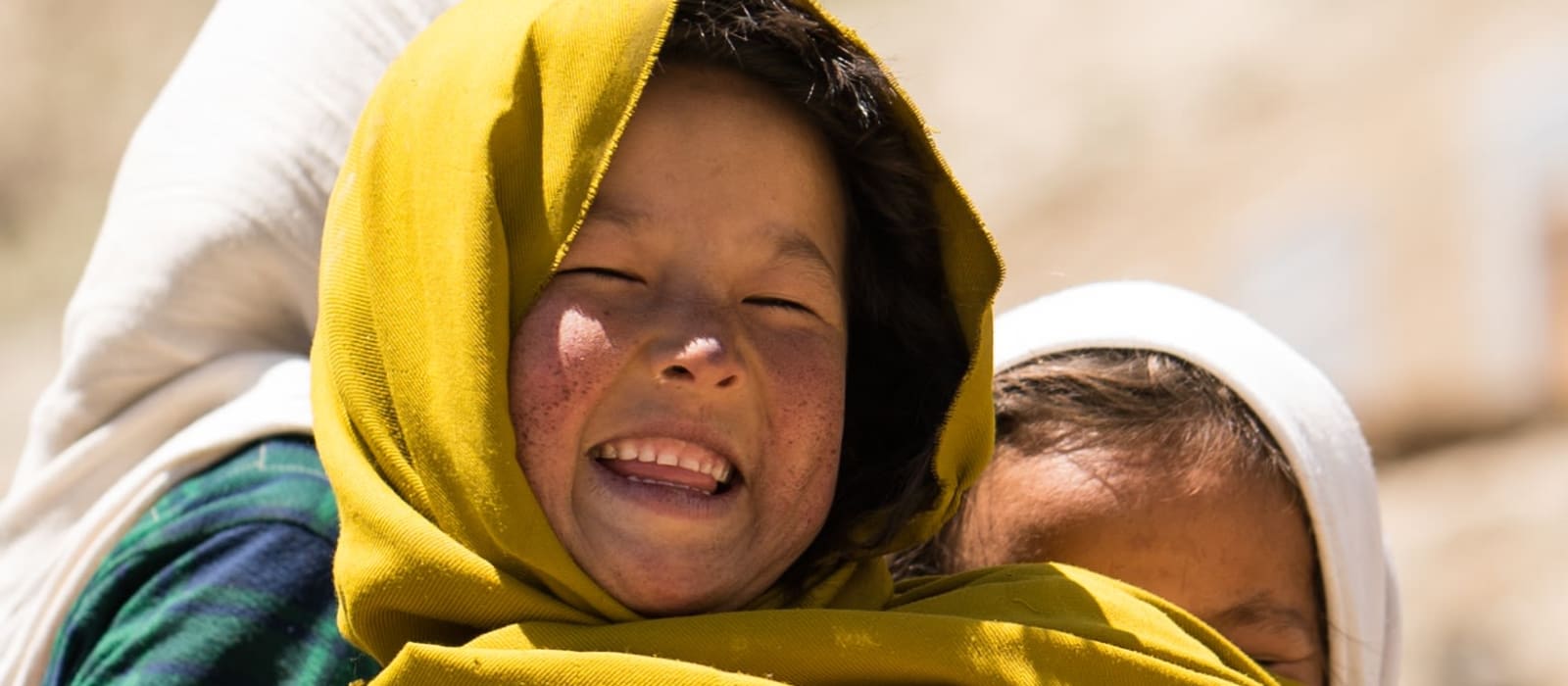 Afghan Girl With Child